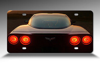 Corvette Black C6 Front Metal License Plate Sign with a View of Rear Tail Lights